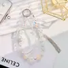 Alça de celular de cristal de alta qualidade, estilo ins, elegante e sofisticada, acessório de pulso feminino, pingente curto para capa de celular, corrente de contas