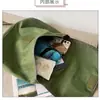 Mochila del Ejército Rojo, diseñada para servir al pueblo, una gran herramienta de aprendizaje, bolso cruzado, estilo vintage, mochila Verde Liberación, material de lona, diseño de cinco estrellas, mochila Lei Feng