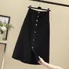 Saia jeans de um botão saia curta feminina 2026 primavera e outono novo estilo temperamento saia midi preta casual versátil saia evasê
