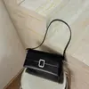 Bolsa de axila estilo baguette de nicho de alta costura transfronteiriça para mulheres, nova bolsa versátil de luxo leve para o dia a dia, de ombro e transversal