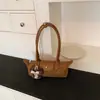 Bolso tipo baguette de lujo de nicho estilo francés, bolso tipo dumpling moderno y a la moda, adecuado para el uso diario, bolso versátil y moderno para hombro y debajo del brazo