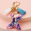 Llavero con 26 letras en inglés, estilo europeo y americano, con borlas de cristal acrílico transparente, adorno para bolso, pequeño regalo.
