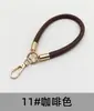 Pulseira de celular em couro PU outono novo, cordão curto para celular, corrente de celular anti-queda e anti-perda para uso externo, atacado