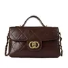Bolso pequeño acolchado de cuero encerado texturizado para mujer, nuevo bolso cuadrado pequeño de mano vintage otoño e invierno 2026, bolso cruzado versátil con cadena