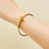 Pulsera Abierta Elástica Estilo Alambre para Uñas Personalizada de Acero Inoxidable de Alta Gama, Superventas Transfronteriza Europea y Americana, Venta al por Mayor con un Tacto Premium