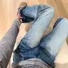 Jeans de Cintura Alta, Caimento Solto, Design Degradê, Levemente Flare com Lavagem Azul Vintage e Aspecto Desgastado, Calça Flare Versátil