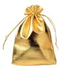 Suministro transfronterizo de bolsas de tela dorada y plateada bolsa de tela rojo dorado joyería joyería texto juego regalo bolsas de embalaje de almacenamiento en stock