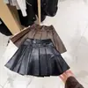 Saia Rantuo para Meninas 2026 Novo Design Saia Curta de Couro Estilosa Infantil para Crianças Maiores Item de Moda Atacado Transfronteiriço