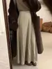 Falda de punto de longitud media para mujer, nueva colección otoño/invierno 2026, con un estilo coreano fluido y casual, cintura alta y una silueta amplia en A.