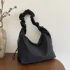 Bolso de axila de gran capacidad estilo coreano para mujer, nuevo modelo 2026, bolso simple de lona de nylon, bolso de hombro y cruzado plisado