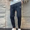 Calça Casual Masculina Nova Primavera e Verão Tecido Sarja Corte Slim Calça Esportiva Preta Calça Juvenil Tendência