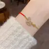Pulsera de Zirconio Completo de Nuevo Estilo Otoño e Invierno para Mujer, Elegante, de Moda, Sencilla, Lujo Ligero, Versátil, Joyería de Cuerda Roja al por Mayor