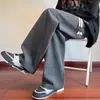 Calça Casual Reta de Tamanho Grande com Padrão Xadrez Diamante Estilo Hong Kong para Homens Nova Moda Primavera 2026 Marca Loose Versátil Patchwork Calça Longa