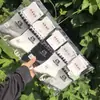 Calcetines Deportivos de Algodón de Caña Media para Hombre y Mujer MeiFuLong Tejido Integrado Punta Sin Costuras 26 Otoño/Invierno Nuevos Al Por Mayor