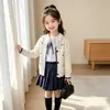 Conjunto de Otoño para Niñas Cuello de Muñeca Manga Larga Nuevo Estilo 2026 Niños Medianos y Grandes Cardigan de Lana Tejido Falda Plisada Conjunto de Tres Piezas