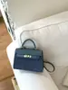 Design Minimalista de Nicho Transfronteiriço 2026 Nova Coleção Primavera/Verão Feminina Exquisita e Fashionável Bolsa Kelly de Ombro Único Transversal de Luxo