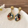 Pendientes de perla asimétricos estilo europeo y americano, pendientes de moda de nicho de alta gama, pendientes llamativos únicos y versátiles