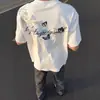 Camiseta de Manga Corta con Estampado Floral Estilo High Street Americano para Hombre 2026 Nueva Marca Moderna de Verano Holgada Estilo Retro Pareja Top