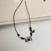 Collar de Cámara Europeo y Americano Nuevo Marrón con Borlas para Mujer Personalidad Exagerada Chicas Calientes Hip Hop Cadena de Lana Nicho Accesorios de Moda