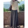 Atuendo atmosférico estilo coreano de principios de otoño: Top de punto de manga larga con cuello alto estilo francés para mujer, capa base ajustada para otoño e invierno