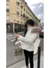 Nueva chaqueta de algodón ajustada estilo coreano para mujer 2026, abrigo de invierno corto blanco entallado con cuello de pelo de mapache