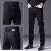 Pantalones de mezclilla de alta gama en negro y gris de Hong Kong para hombre, nueva colección primavera 2026, estilo de pierna recta, elásticos, pantalones largos casuales, ropa de hombre de moda