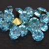 Venda por atacado DIY joias de unhas acessórios cor de vidro redonda pontiagudo fundo strass doméstico de alta qualidade uma broca de cristal de diamante