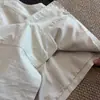 Chaleco cárdigan de punto liso retro japonés para mujer, otoño 2026, cuello redondo, botones a presión, con sentido del diseño y cordón para usar en capas en otoño