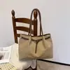 Las populares y ultramodernas bolsas de mano retro de terciopelo de este año, nuevo modelo 2026 para el trabajo y los desplazamientos, bolsa de gran capacidad para mujeres