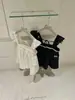 Wgwe8834 Ropa de Mujer Shisanxing de Guangzhou Primavera/Verano Nuevo Top Babydoll de Tirantes con Cuello Cuadrado y Adorno de Encaje