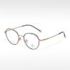 Gafas de montura ovalada pequeña y fresca, pegamento dorado de moda T22055, semi-titanio, se pueden equipar con montura óptica para miopía, anti-luz azul