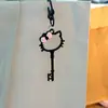 Chaveiro Pingente Liga Cartoon Gato KT Cor Macaron Design Criativo Vazado Gato Fofo Pingente para Bolsa Mi