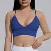 Sujetador deportivo de punto sin costuras de color liso ajustado para mujer, transfronterizo europeo y americano, adecuado para correr, fitness y yoga