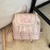 Mochila de encaje con lazo transfronteriza de nicho para mujer, moda de verano 2026, sensación de alta gama, bolso de mano para viajes