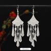 Brincos de borla de prata Miao artesanais estilo étnico vintage temperamento feminino Yunnan Miao personalidade estágio brincos longos versáteis
