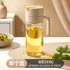 Nuevo dispensador de aceite por gravedad de vidrio con apertura y cierre automáticos para cocina casera, gran capacidad, botella antigoteo para salsa de soja, botella de vinagre, botella de condimentos