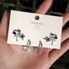 Brincos de tarraxa novos transfronteiriços de nicho ins de luxo leve com óleo preto pingado adoráveis brincos de estrela de cinco pontas em forma de gota d'água femininos conjunto de 3 peças