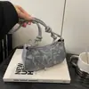 Bolsa Elegante e Estilosa 2026 Novo Modelo PU Moda Nicho Design Bolsa de Ombro Versão Coreana Simples Feminina Bolsa de Braço