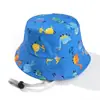 Nuevo sombrero de pescador con diseño de dinosaurio de dibujos animados para niños, transpirable, a prueba de viento y sol, para bebés, hombres y mujeres, para viajes al aire libre, aprobado por fábrica.