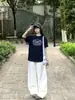 Pantalones blancos estilo americano de guadaña para mujer, nueva colección primavera 2026, pantalones anchos de pierna ancha de tiro alto con caída relajada, pantalones casuales