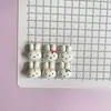 Parches lindos de resina de conejito blanco, funda de teléfono con pegamento de crema, accesorios para el cabello, pinzas para el cabello, accesorios para joyería DIY, materiales al por mayor