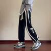 Pantalones deportivos americanos para hombre otoño e invierno a rayas con estampado de números estudiante casual juvenil tobilleros deportivos pantalones largos para hombre