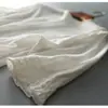 Top de encaje hueco de manga corta para mujer 2026 Nuevo estilo Primavera/Verano Diseño de cuello semi-alto con elegantes mangas abullonadas Blusa versátil