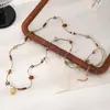 2026 Collar Retro de Cuerda Tejida a Mano con Cuentas de Acero de Titanio para Mujer Diseño de Nicho Estilo Étnico Cadena para Suéter Accesorios de Flor