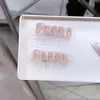 Naizi flor de unha de mão sonho sala três dimensional gelo através flor de cinco pétalas olho de gato francês adesivo de arte de unha atacado