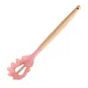 Barril de almacenamiento spot transfronterizo con mango de madera, utensilios de cocina de silicona, juego de 12 piezas de cuchara para cocinar antiadherente, pala, herramientas de cocina