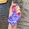 Nuevo llavero giratorio UV de dibujos animados Sanrio, lindo juguete divertido de Kuromi KT, colgante para mochila de estudiante