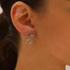 Exquisitos pendientes con nudo de cinta de estrella intermitente para mujer, ligeros, de lujo, de diseño de alta gama, modernos pendientes de lazo que combinan con todo.