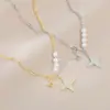Cadena para Clavícula Elegante con Zirconia Galvanizada en Oro Real Diseño de Nicho Femenino Collar de Perla Estrella de Cuatro Puntas Moda Collar Versátil