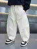 Calça tesoura de algodão para meninos Primavera e Outono Estilo Coreano Infantil Estilosa Versátil Casual para Meninos Jovens Atacado